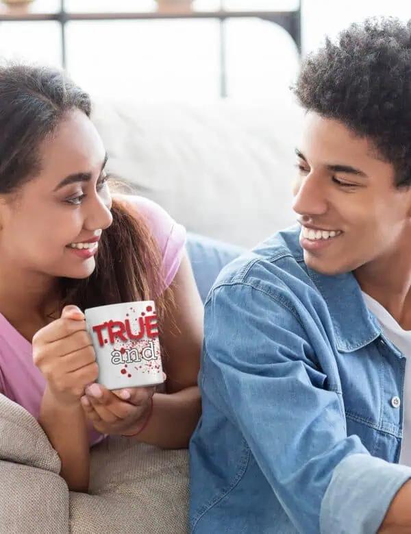 Couple drinking from true crime coffee mug