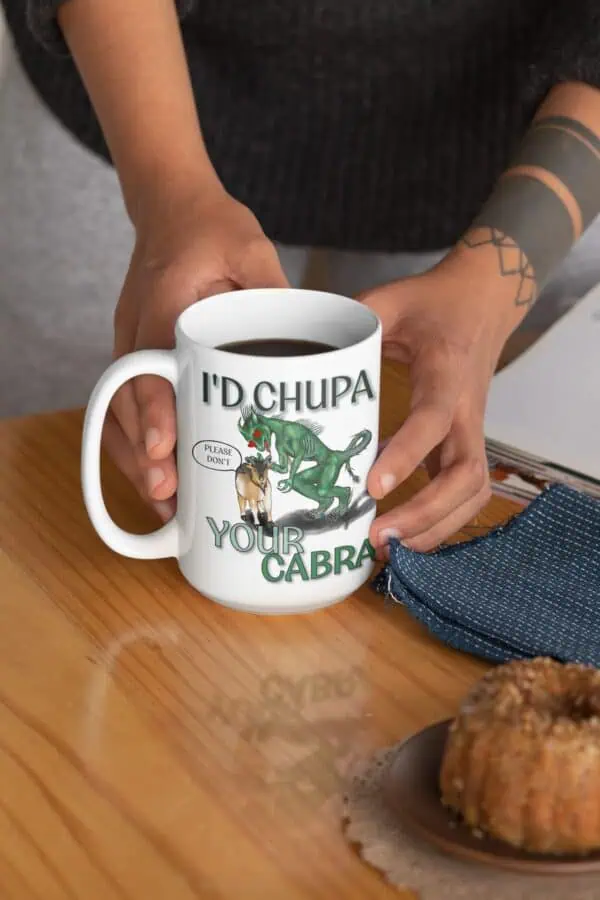 chupacabra cryptid coffee cup on table