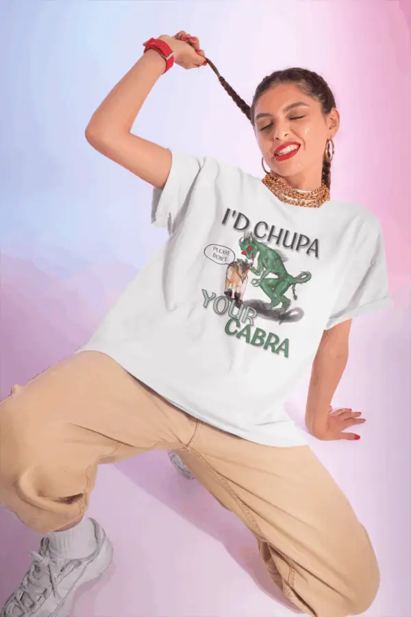 flirty girl wearing cryptid t shirt with I'd chupa your cabra on it