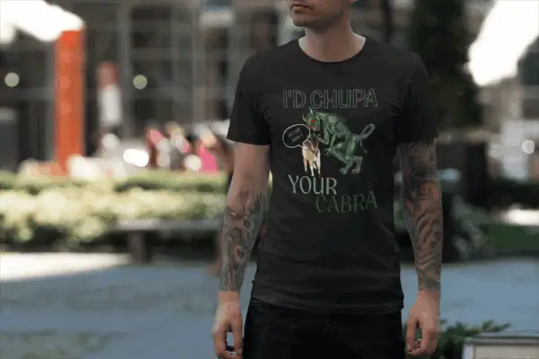 Man in a cryptid I'd chupa your cabra shirt