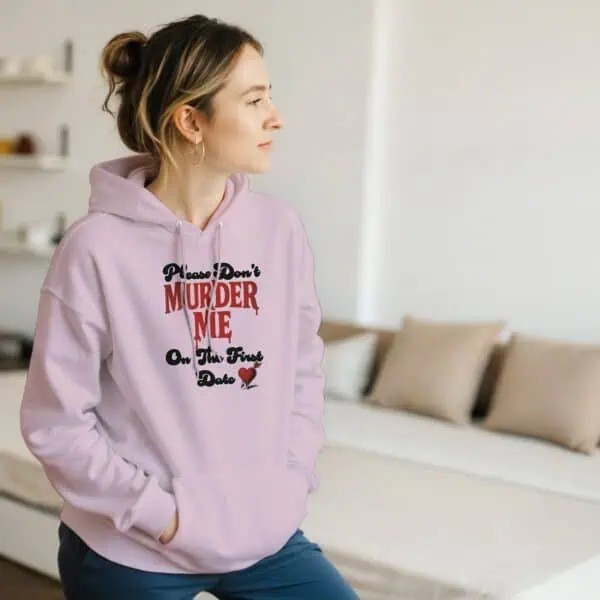 woman in cozy true crime hoodie for domestic violence charity