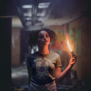 spooky girl in cute goth witch t-shirt